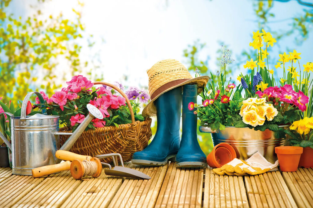 fruehlingsblumen gummistiefel giesskanne gartenwerkzeug 2023